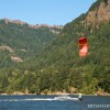 a kiteboarder rides in the columbia river a kiteboarder rides in the columbia river