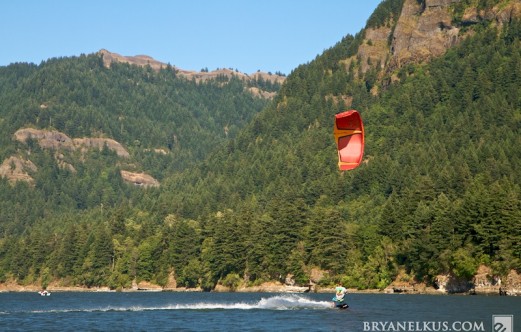 a kiteboarder rides in the columbia river