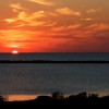a fire like sky in classic cape hatteras sunset over the pamlico sound