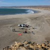 kiteboarders post up for a desolate session in northern peru