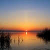 the epidemy of a classic cape hatteras sunset with a reflection