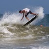 BRYANELKUS_260279 Cody Craig does an air reversal surfing in the outer banks