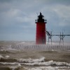 the south haven pier getting battered by waves on lake michigan