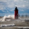 the south haven pier getting battered by waves on lake michigan