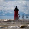a surfer infront of the south haven pier