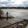 A Michigan Surfer heading into the water