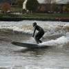 a surfer riding in lake michigan
