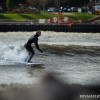 a surfer riding in lake michigan