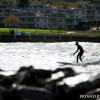 a surfer riding in lake michigan