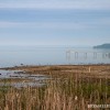 Traverse City Bay early morning with a dock jetting into the water