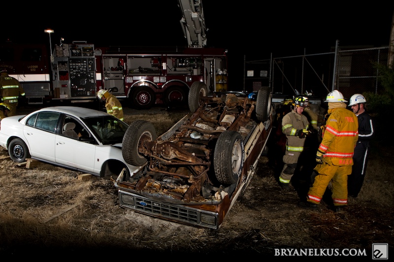 a Crew of North Carolina Firefighters assess the scence