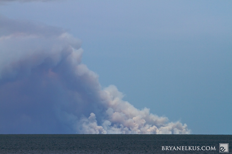 smoke rises from stumpy point across the Pamlico Sound from Rodanthe