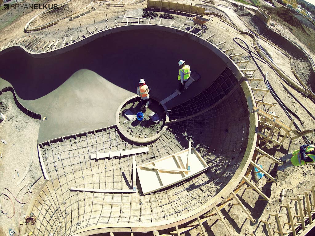 Laying concrete in the deepend of the clover bowl at the Ann Arbor Skatepark in Michican