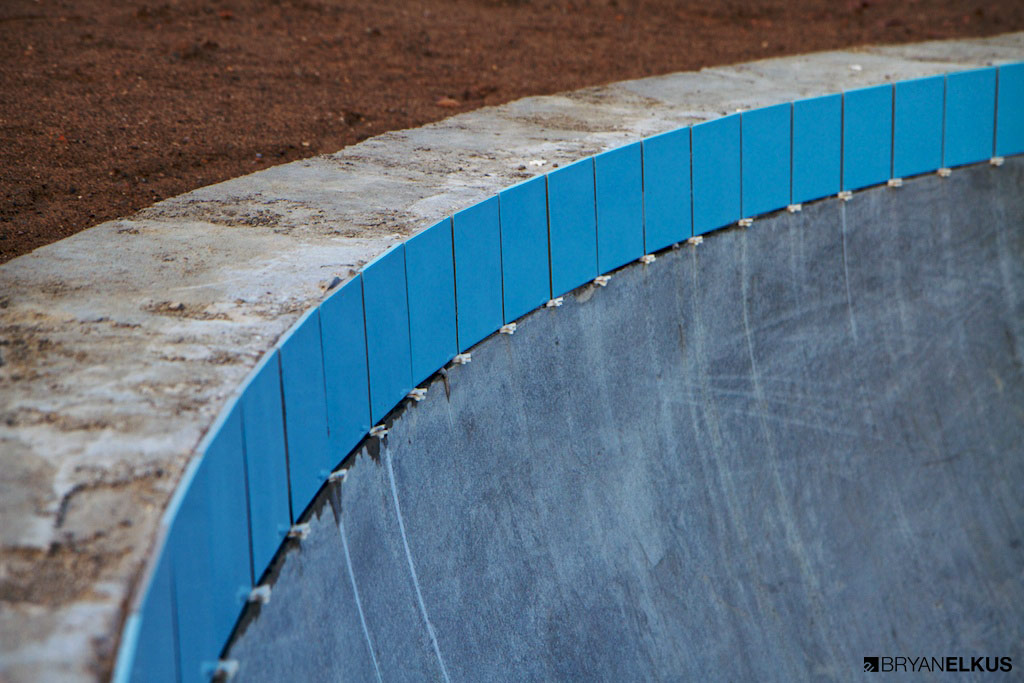tiles of the ann arbor skatepark going on the top two bowls